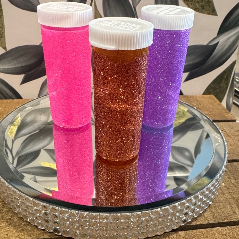 Handmade glittered medicine bottles